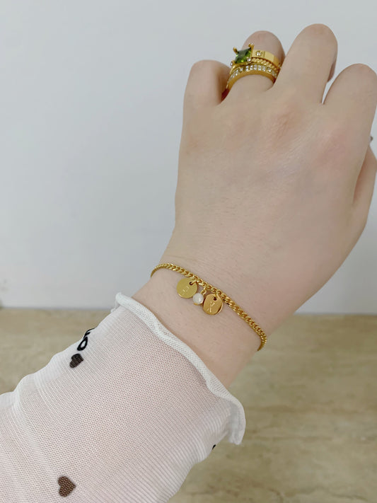 Tiny disc initial birthstone bracelet